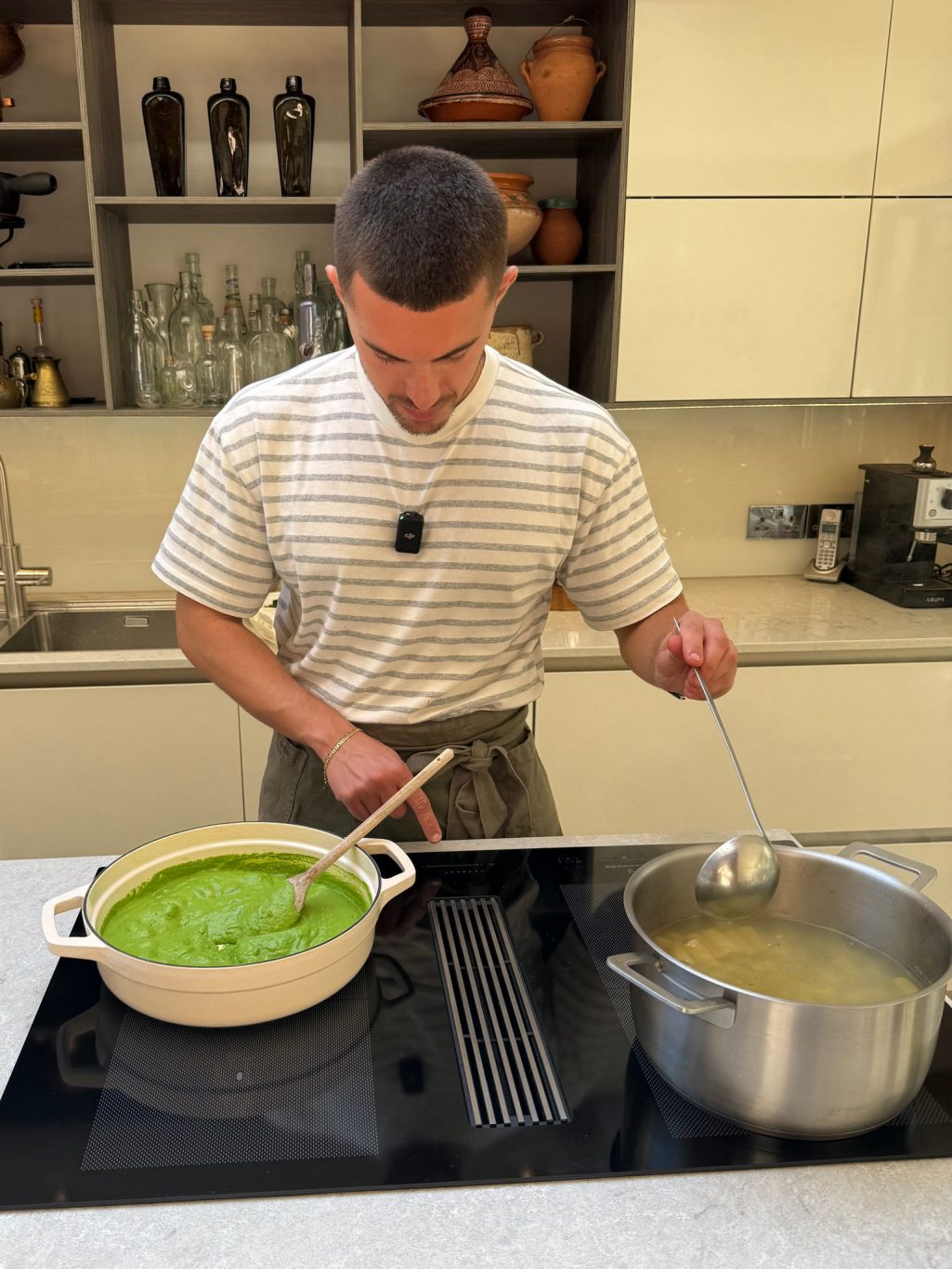 Sepps cooking in the Franke kitchen using the Mythos 2gether Hob Extractor