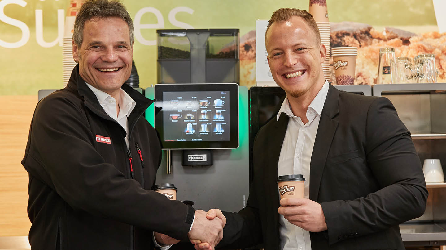 Franke Coffee Systems, Landi Switzerland, handshake, business partners, cooperation