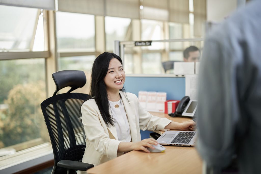person in front of a laptop