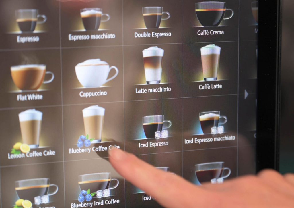 Franke Coffee Systems, coffee machine screen close-up with finger, beverage variety, beverage choice, coffee menu