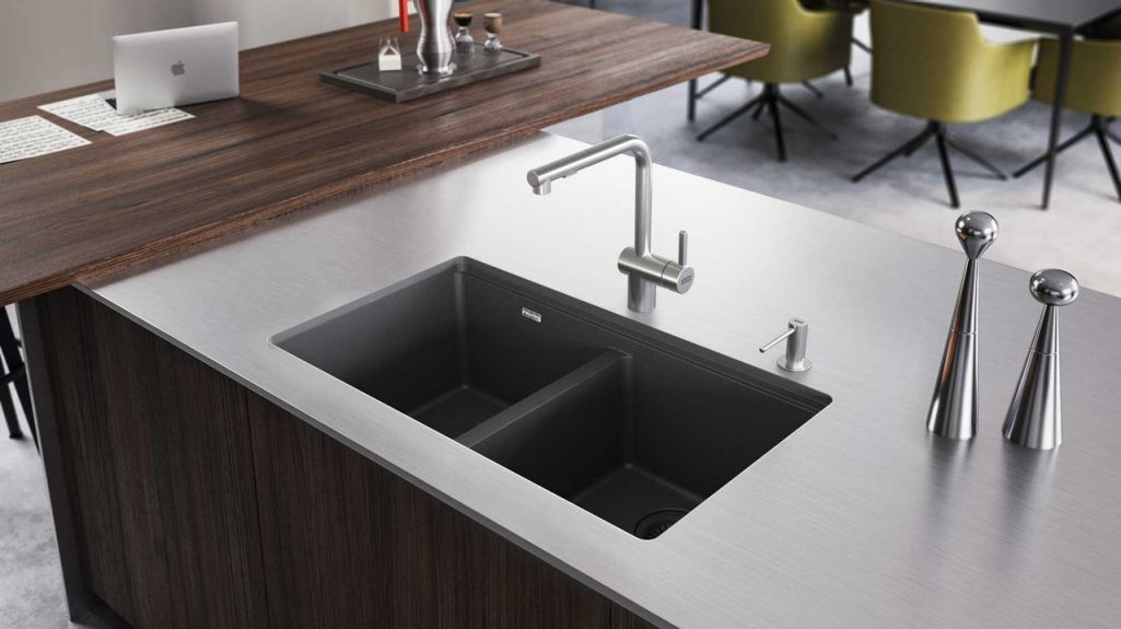Kitchen island with a double bowl matte black undermount granite sink